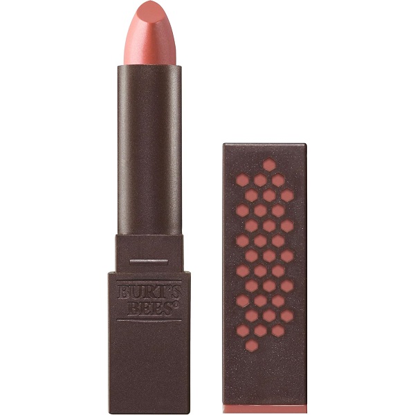 Burt’s Bees lipstick in a dark brown square tube with cap beside it, showing a nude pink shade.