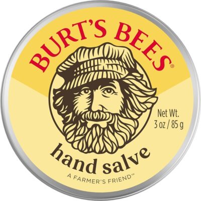 Burt’s Bees Hand Salve tin container with yellow label and farmer illustration, 85g.