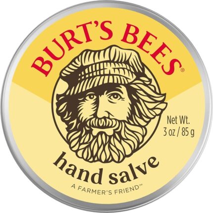 Burt’s Bees Hand Salve tin container with yellow label and farmer illustration, 85g.
