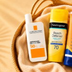 Top-rated beach and sports sunscreens displayed in a summer basket, representing the search for the best sunscreen for Indian skin.