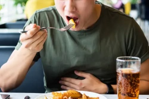 Signs of an unhealthy gut shown through fresh, gut-friendly whole foods